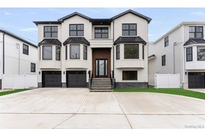 Welcome to 917 Greenfield Rd, a stunning new construction in the prestigious Academy Area of Woodmere.