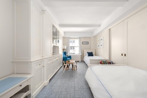 Meticulously renovated classic prewar seven room home, in one of the Upper East Side's premier full service coops buildings.