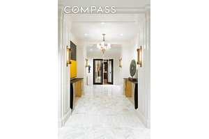 Ideally located on East 71st Street and situated in one of Park Avenue s most prestigious and sought after pre war cooperatives, this triple mint high floor duplex residence is ...
