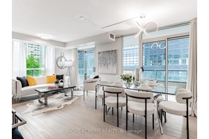 Stunning Open Concept SW Corner Unit !