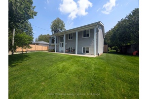 Welcome to this beautifully maintained one owner home nestled in the heart of Inverhuron, where pride of ownership shines throughout.