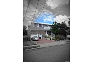Grand SH Colonial with many unusual features including wood wainscoting, carved beams, wood floors all extra large rooms.