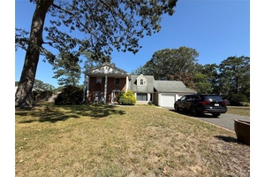 Welcome to this charming home located on a quiet residential block in Coram !