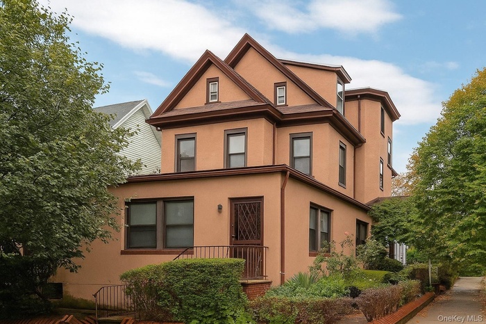 View of front of property with stucco siding