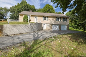 Welcome to this beautifully updated 3 bedroom, 2 full bath Ranch style home, perfectly situated on a spacious corner lot within the Arlington Central School District.