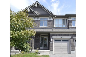 Gorgeous Richcraft, well built, bright, freshly painted, features a formal great room and dining room with hardwood floors and 9 foot smooth ceiling on the main level.
