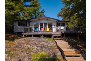 Enjoy this fully furnished cottage many months of the year located on a 4 season municipal paved road.