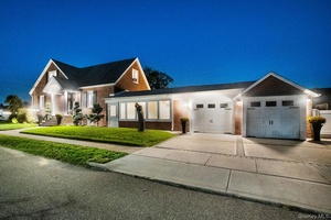 Welcome to this breathtaking Valley Stream luxury home, perfectly situated on a rare double lot.