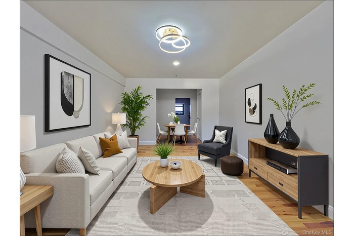 Living room featuring light wood-style flooring