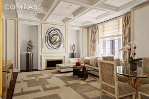 Welcome to this impeccably renovated residence at the prestigious 907 Fifth Avenue a stunning two bedroom with a home office in one of the city s most coveted co ops.