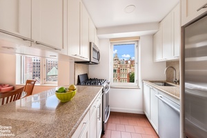 Corner, Split 2 bedroom, 2 bath home with three exposures to the South, West and North including a south facing balcony !