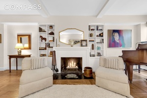 Perfectly situated in the heart of the Upper East Side, this rarely available 2 bedroom, 2 bathroom home offers timeless pre war charm and exceptional convenience.