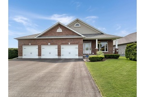 This original owner, unique and one of a kind custom designed Mirtren built 4 level back split with 3 car garage is ideally located on a professionally landscaped premium lot ...