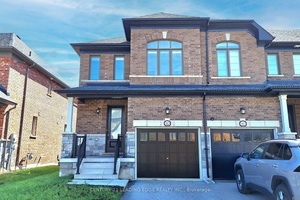 ! ! Rarely Offered End Unit Townhome With Walk Out Basement Backing Onto A Scenic Pond !