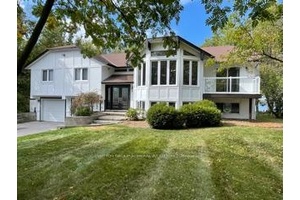Motivated Seller in Prestigious Bayshore Village Rare Waterfront Opportunity.