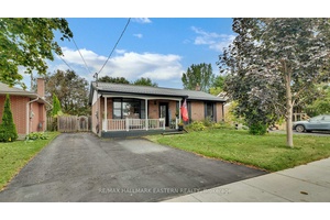 Perfect brick bungalow with a spacious backyard that offers all the peaceful vibes of country living right in town !