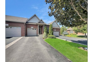 Welcome to 15 Iron Bridge Court, a beautifully maintained freehold bungalow townhome nestled on a quiet court in the heart of Caledonia.
