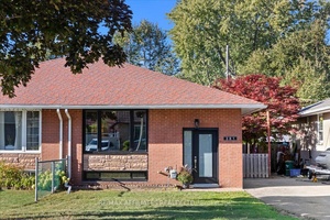 Charming 3 Bedroom Semi Detached Bungalow with In Law Suite Potential.
