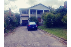 2 Storey Brick House With Year Round Indoor Swimming Pool !
