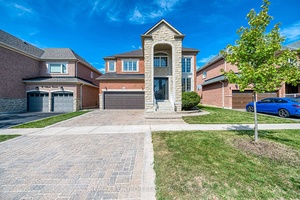 Bright amp ; Spacious Home with 9 Ceilings amp ; Hardwood Floors on Main.