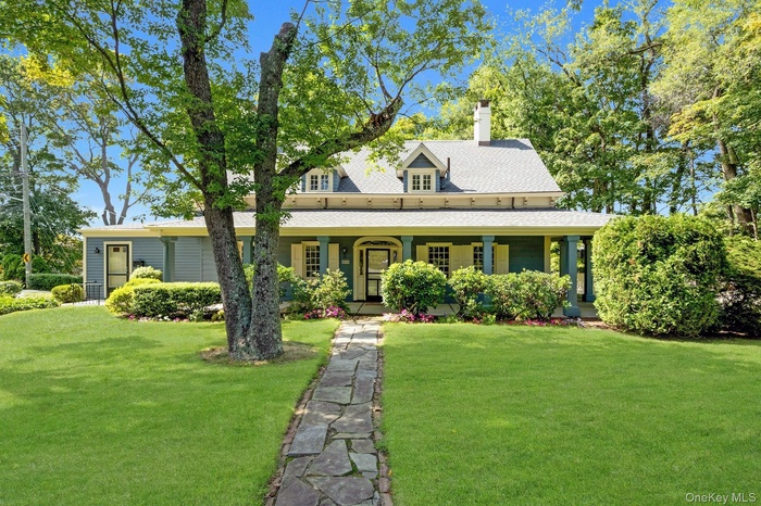 Inviting home with stone walkway and front porch