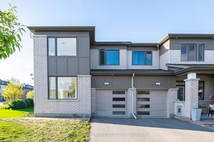 Welcome to 2307 Watercolours Way, a spectacular corner lot, two storey townhouse with 3 bedrooms, 2.