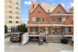 All brick young semi detached 2 family in Fresh Meadows.