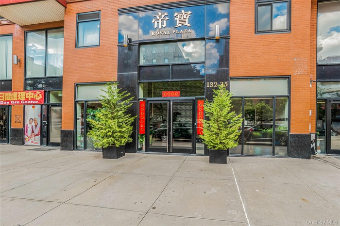 Property entrance with brick siding