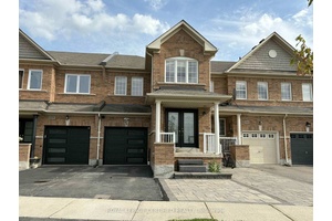Gorgeous townhouse offering approximately 2, 700 sq ft of living space.