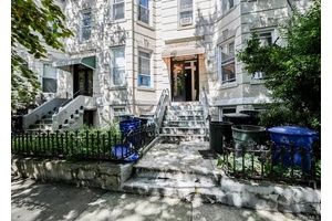 Welcome to this charming legal three family residence.