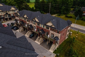 Rarely offered 2019 3 storey freehold townhome with a backyard in Ancasters desirable Harmony Hall community.