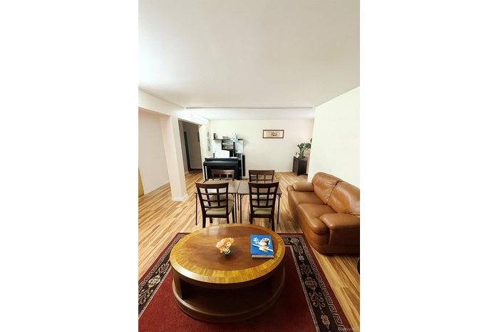 Living room featuring light wood-style floors