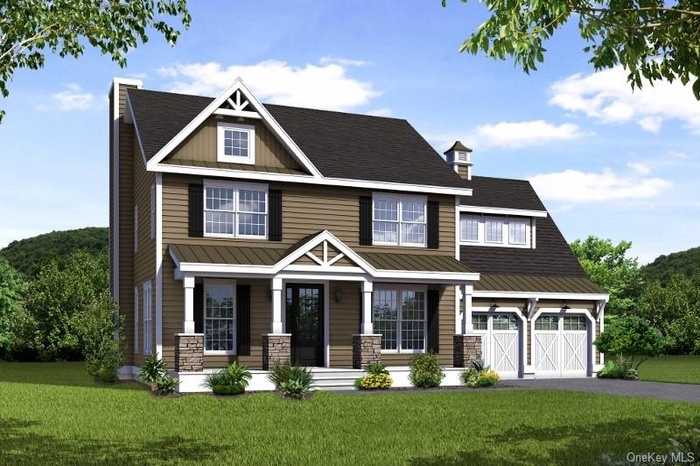 Craftsman house featuring covered porch, a front lawn, asphalt driveway, and roof with shingles