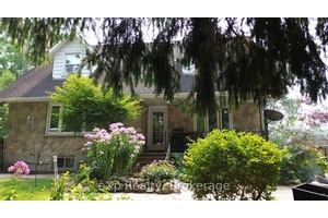 Welcome to this delightful Cape Cod style family home, full of warmth, character, and charm !