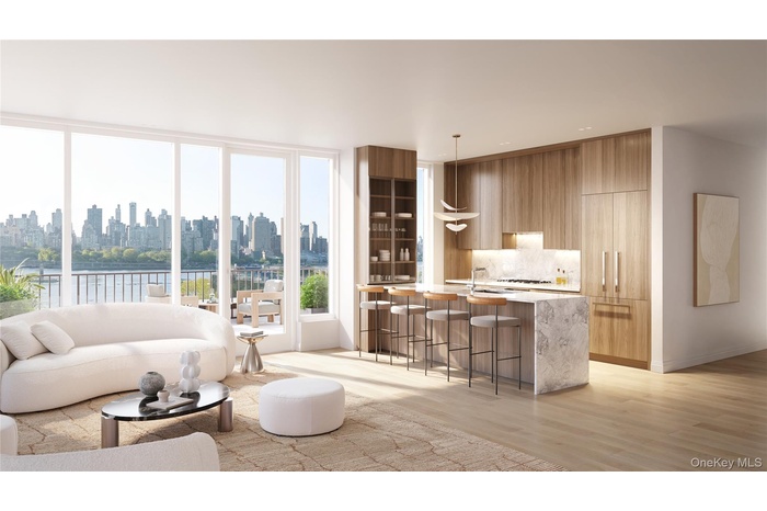 Living area featuring plenty of natural light and light wood-style flooring