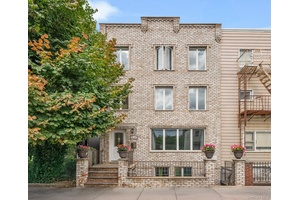 This brick semi detached three family home offers outstanding income potential in Astoria.