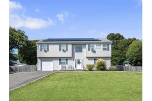 This expansive hi ranch was built in 2003 and is ideal for multi generation living or house hacking in a prime location.