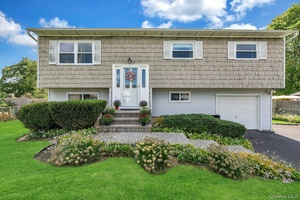 Step into this beautifully maintained Hi Ranch nestled in the sought after Holiday Park neighborhood of Centereach.