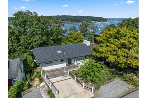 Quietly nestled just moments from Northport Harbor and the vibrant Village, this fully reimagined 3 bedroom, 2.