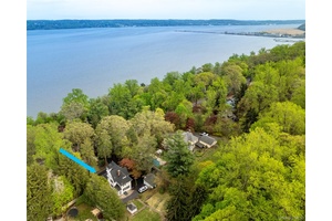 Just 20 minutes from the George Washington Bridge, this river view retreat blends the ease of a village lifestyle with the beauty of the Hudson Valley.