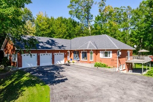 Welcome to this custom built, all brick executive bungalow, offering nearly 4, 000 sq ft of impeccably designed living space on a breathtaking treed and landscaped property.
