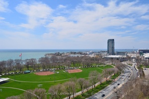 Stunning Lakeview Condo with Sun filled corner unit with great views, breathtaking south facing park and lake views.