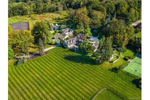 Skyland Farm. Set on one of the most prestigious country lanes, this Bedford estate sits on over 25 acres of spectacular property with rolling land, scenic views and gorgeous landscape.