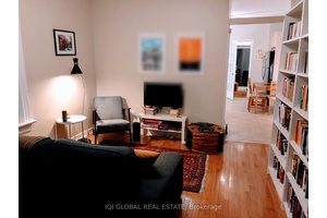Fully Renovated 1 Den Unit with PRIVATE BACKYARD.