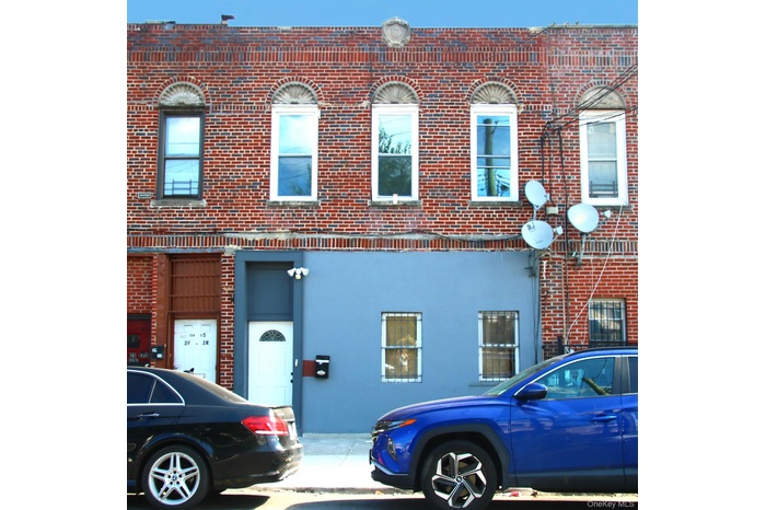 View of front of property with brick siding