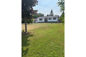 Charming 3 3 bedroom raised bungalow on a large lot just steps to Willow Beach.