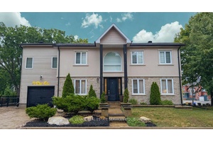 Located just steps from Whitbys vibrant Four Corners district, this exceptional 4 1 bedroom, 4 bathroom custom built home blends timeless design with modern comfort ideal for families or multi ...