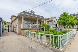 Fabulous bungalow featuring a rear second floor addition, offering a total of over 2, 300 square feet of living space 1, 569 square feet above ground and 800 square feet ...