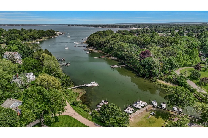 Aerial overview of property's location featuring a large body of water
