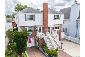 Charming and Meticulously Maintained Single Family Home in Prime City Island Location.